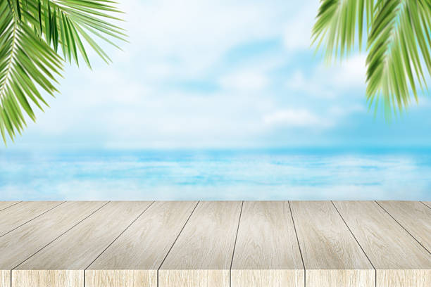 istock Wooden table with a view of the ocean 2208718457