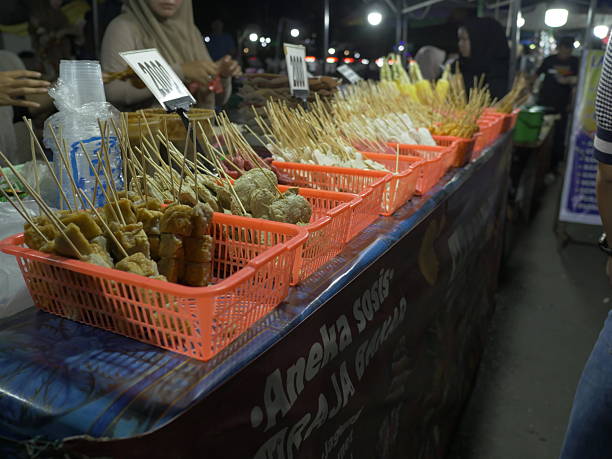 istock selling snacks at the night market 2208721610