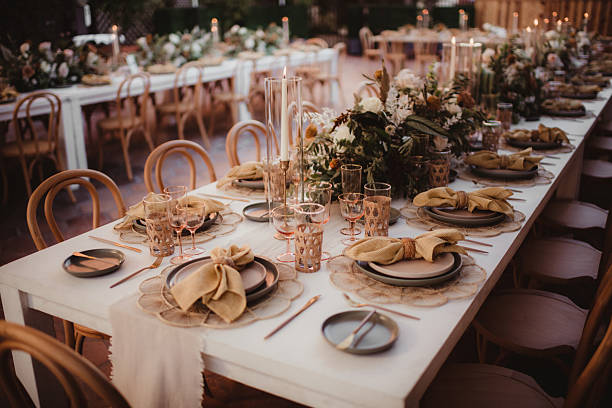 Wedding reception outdoors with candles and flowers