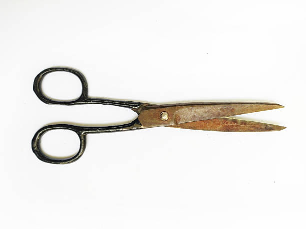istock Isolated vintage scissors on white. Rust adds character Symbolizes craftsmanship, cutting, tailoring. Great for retro designs, antique themes, DIY projects. 2208726042