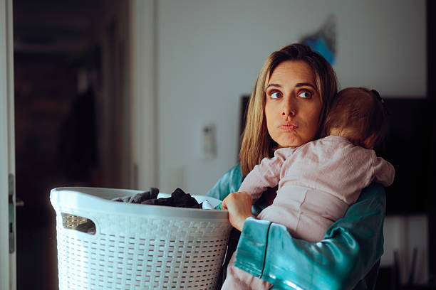 Unhappy mother feeling tired and desperate for help with home chores