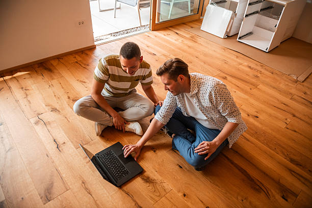 istock Professionals Reviewing 3D Home Renovation Plans 2208733503