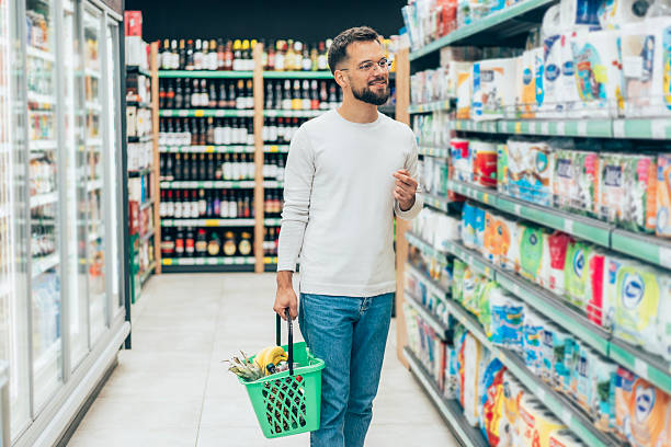 istock Handsome man shopping in supermarket 2208735218
