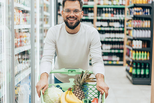 istock Handsome man shopping in supermarket 2208735222