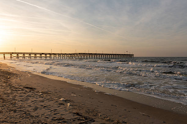 istock Oak Island Pier at Sunrise with Waves 2208735339