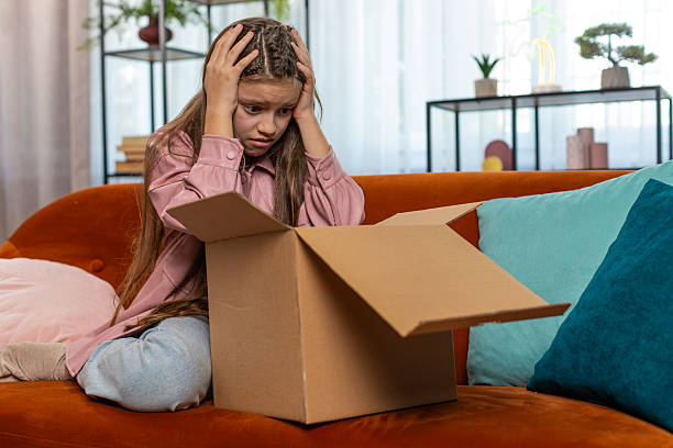 istock Angry dissatisfied shopper girl unpacking parcel feeling upset mistake delivery broken purchase gift 2208735650