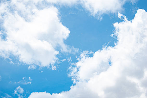 Blue clear sky with lots of clouds
