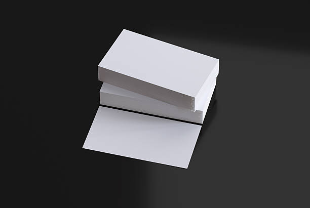 istock Stack of Business Cards on Black Glossy Background 2208768961