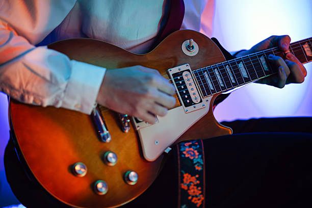 Classical fretboard six-string electric guitar.