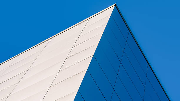 istock fragment corner of a modern building on a blue background 2208775121