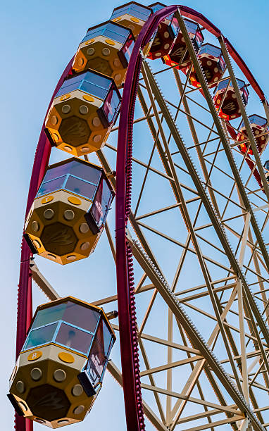 istock ferris wheel in the park against the blue sky 2208775138
