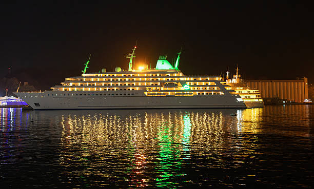 Muscat, Oman, March 17, 2024: View of a shin anchored in the harbor of Muscat in the evening.