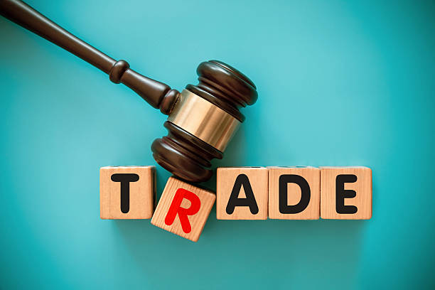 istock Gavel and wood block with TRADE 2208779355