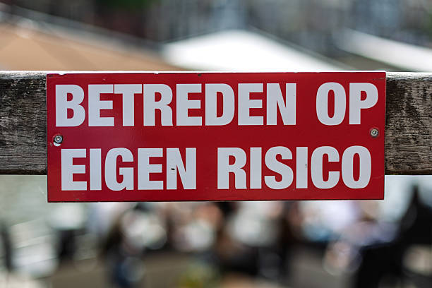 Amsterdam, The Netherlands. May 12th, 2023:\nA close-up shot of a bold red sign with the Dutch warning \