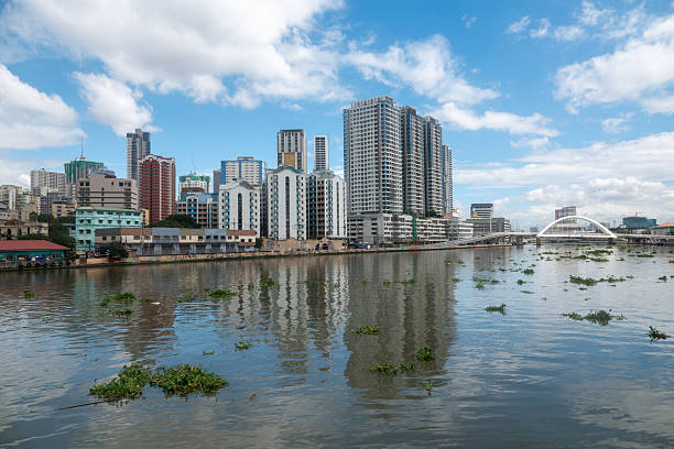 istock Skyline of manila by Pasig River in philippines 2208787458