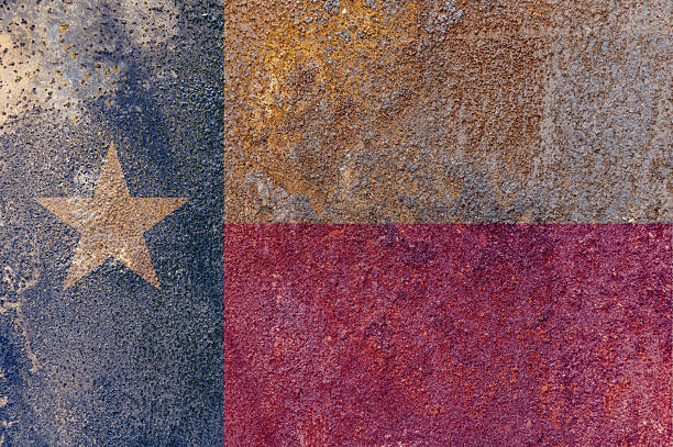 istock Texas State Flag. Dirty Texas state flag on rusty metal surface. 2208787663