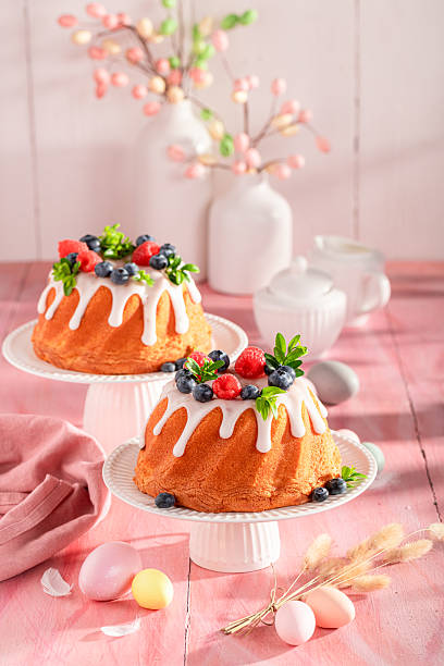 istock Tasty ring cake for Easter with raspberries and blueberries. 2208791589