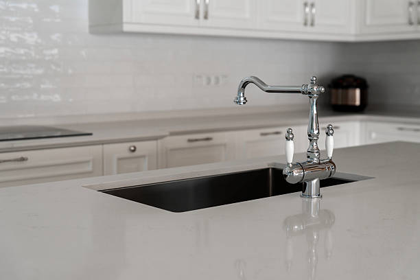 istock Chrome-plated double-lever kitchen faucet with water filter 2208792822