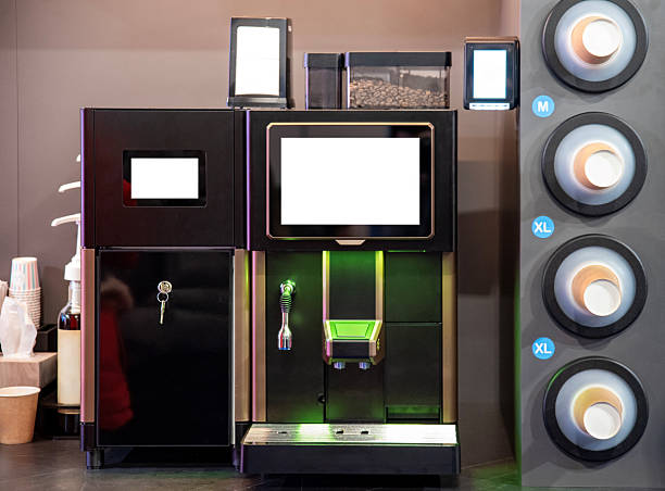 istock Vending coffee machine with screen and cup dispenser in self-service area 2208800515