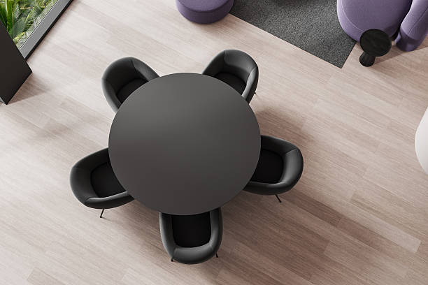 istock Top view of modern round table with four chairs in stylish office space. 3D Rendering 2208808382