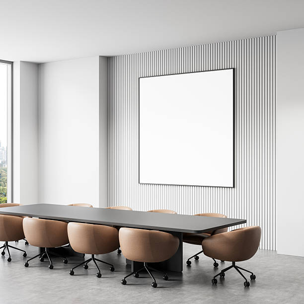 istock Modern conference room with blank framed poster on wall. 3D Rendering 2208808455