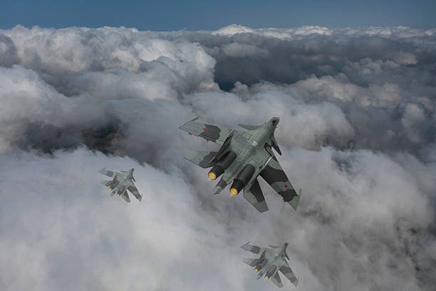 istock Air Force Fighter Jets flying over clouds. High Above The Clouds. 2208810747