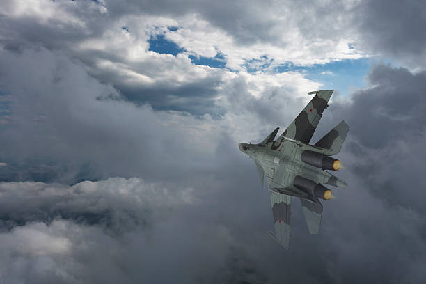 istock Air Force Fighter Jets flying over clouds. High Above The Clouds. 2208810868