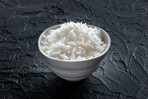 istock White rice, cooked. A bowl of boiled long grain rice, a simple side dish 2208814906