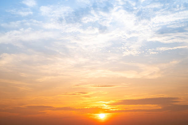 istock Beautiful , luxury soft gradient orange gold clouds and sunlight on the blue sky perfect for the background, take in evening,Twilight, Large size, high definition landscape photo 2208820653