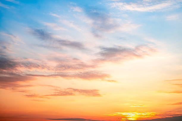 istock Sky,sunset, beautiful , luxury soft gradient orange gold clouds and sunlight on the blue sky perfect for the background, Sunrise on morning or everning in winter warm time ,Twilight summer,silhouette 2208821421