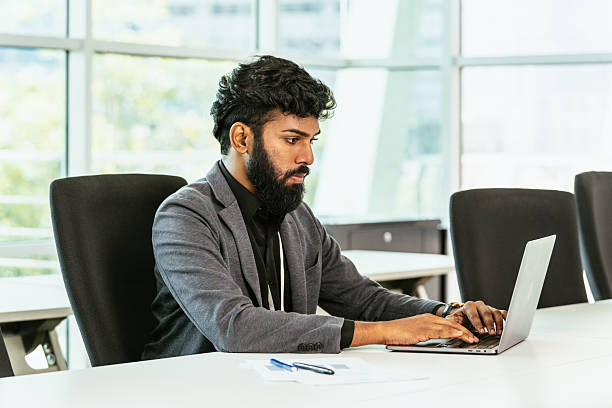 istock Indina financial advisor having video call on laptop in modern office 2208825978