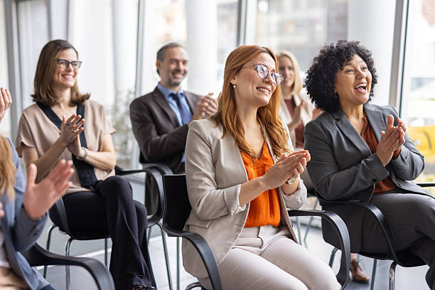 istock Cheerful Audience Applauding During a Corporate Discussion 2208827203