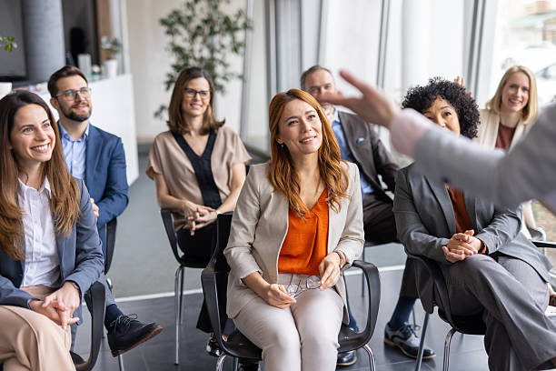istock Attentive professionals listening during an informative talk 2208827210