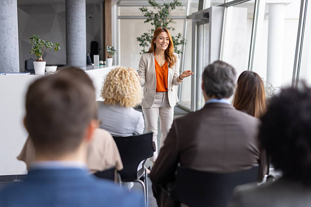 istock Confident Businesswoman Delivering Multi-View Presentation 2208827246