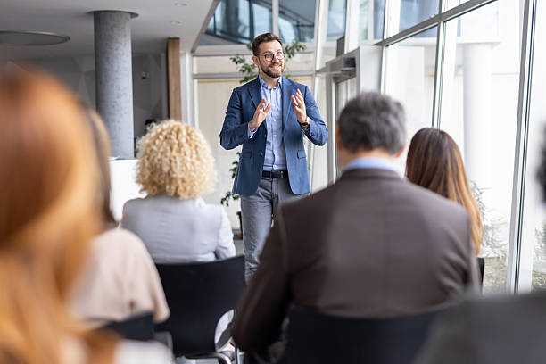 istock Stylish Presenter Sharing Insights In Engaged Atmosphere 2208827247