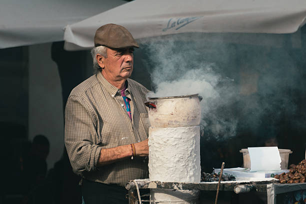 Seville, Spain; December 15th 2024: Street stall selling roasted chestnuts.