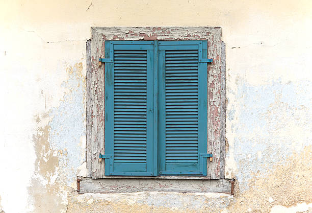 istock Blue old wooden window shutters 2208828991