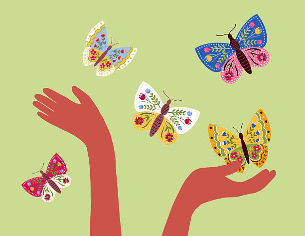 istock African American Hands Holding Butterflies In The Sky. Environment Concept 2208832298
