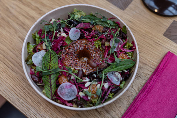 specially prepared salad served, fine dining