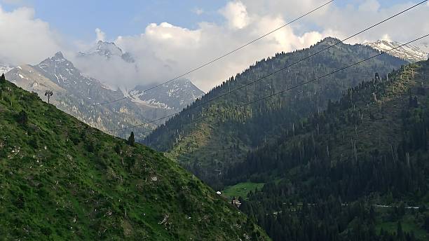 istock Mountain view. Green pines. Mountains in Almaty, Medeo 2208833058