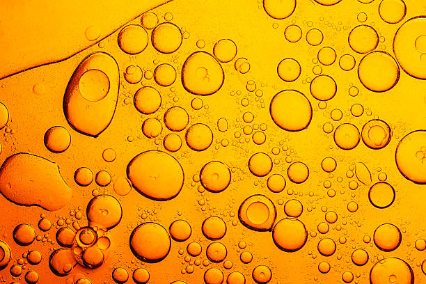 istock Macro yellow bubble texture,Processed collage of golden yellow oil bubble texture. Background for banner, backdrop or surface. 2208836862