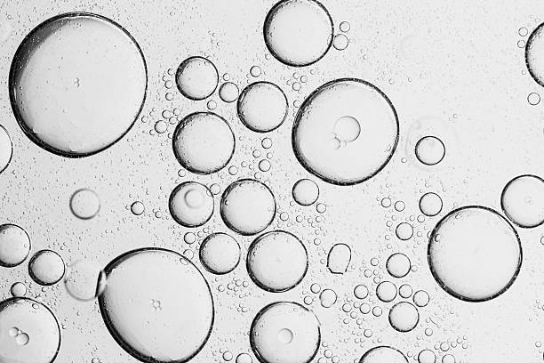 istock Close-up macro bubble texture,Close up macro Aloe vera gel serum cosmetic texture blue background with bubbles. Cruelty free. Lemongrass gel skincare product. antibacterial liquid with aloe vera, moisturizing. 2208836873