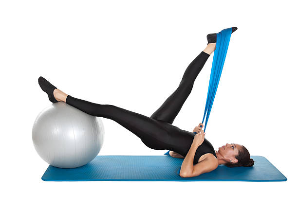 istock one leg hip lift , Stott Pilates approach to original Pilates , core stability, spinal alignment, effective exercise 2208841239