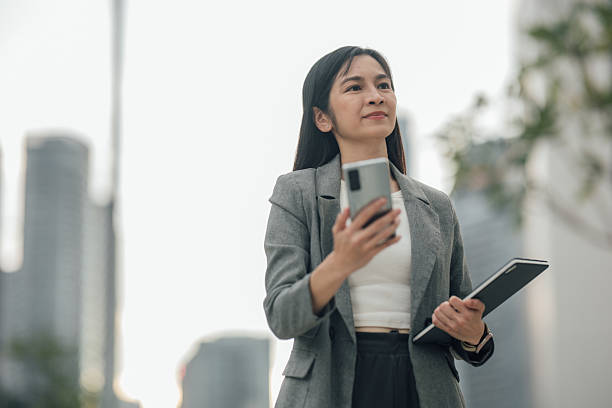 istock With a Tablet in Hand and Vision in Mind: A Professional Woman’s Urban Journey 2208843482
