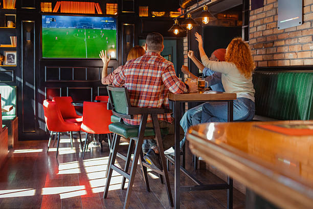 istock Live Sports Fever: Friends United in Excitement 2208843807