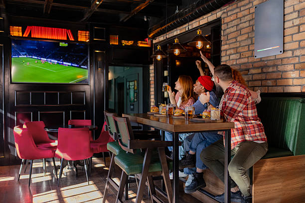 istock Live Sports Fever: Friends United in Excitement 2208843844