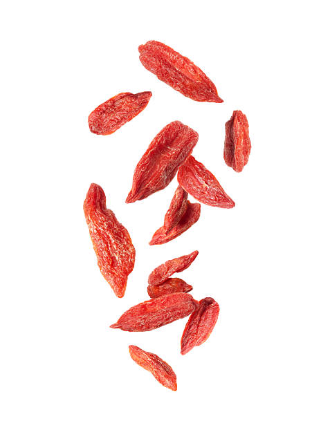 istock Dried goji berries in the air close up on a white background 2208845697