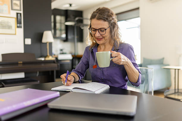 istock Beautiful woman working from home 2208845862