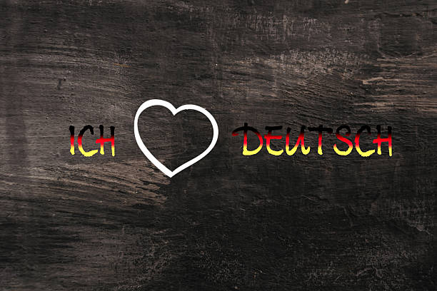 Heart is drawn on a black background with the words Ich and \