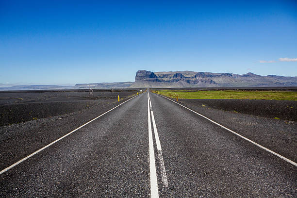 Endless road through the steppe in Mongolia